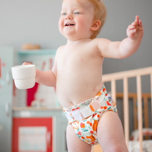 fruit-all-in-two-reusable-nappy-on-baby-standinh-with-cup (1)
