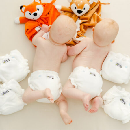 babies in night nappies with 4 extra nappies
