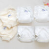 4 night nappies and 2 wool covers